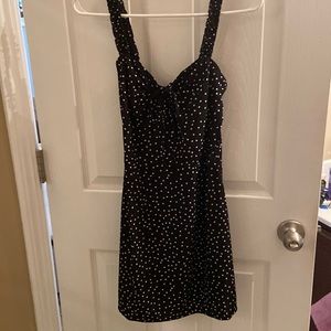 Black dress with white polka dots